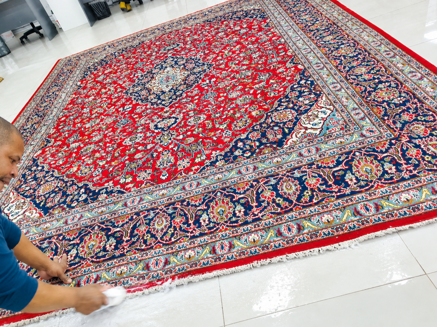 Persian carpet during traditional hand cleaning